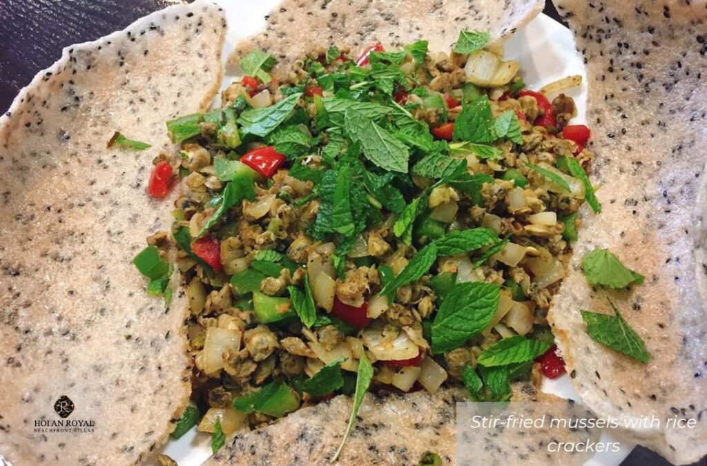 Stir-fried Mussels with Rice Crackers – a signature dish of traditional Hoi An cuisine