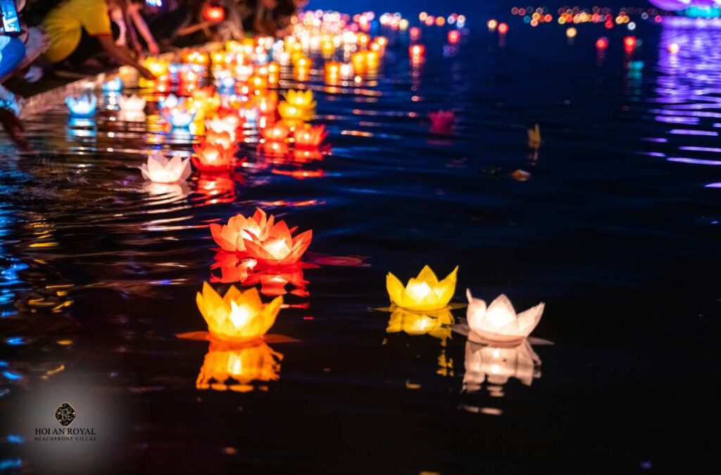Releasing floating lanterns on the Hoai river