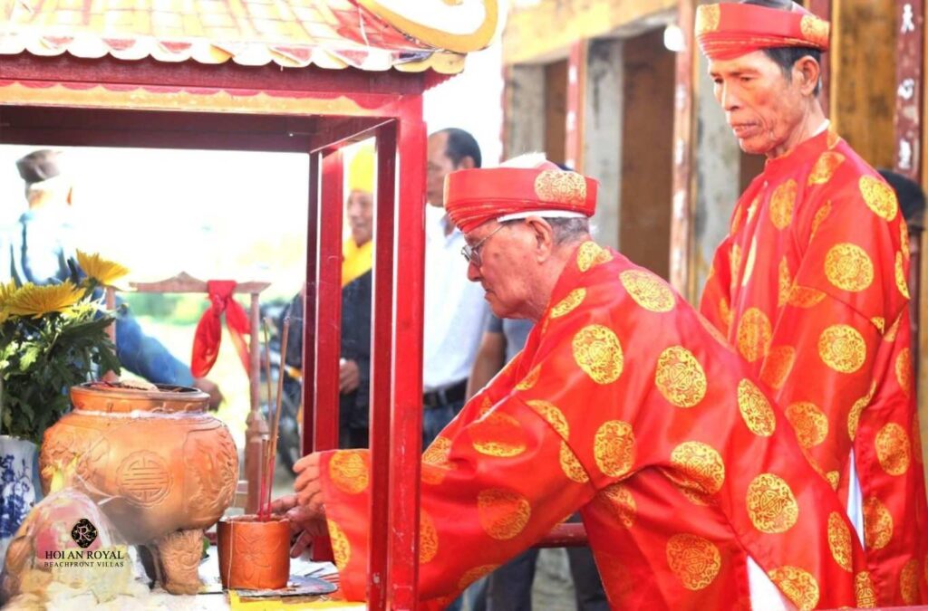 Village elders, officials, and residents offering incense to the craft ancestors